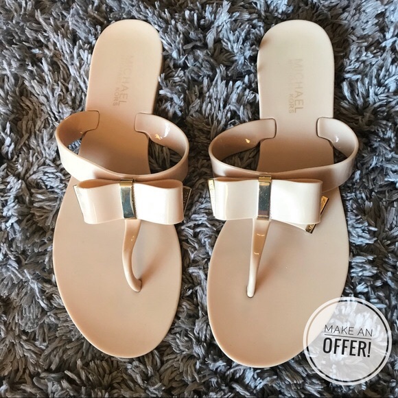 Michael Kors Shoes - HP ❤️ NWOT Michael Kors Kayden Thong Jelly Sandals 👛